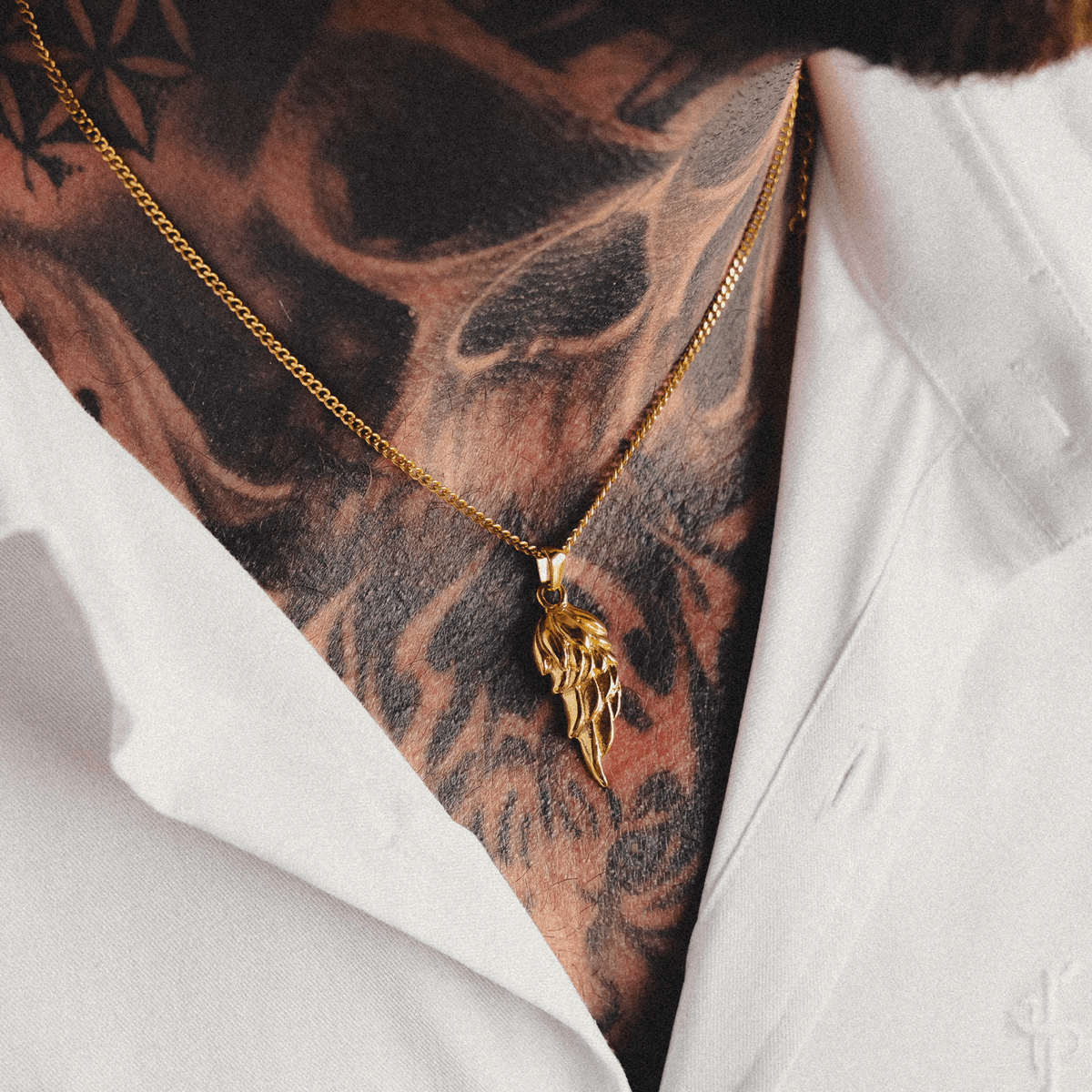 Gold Feather Pendant Necklace