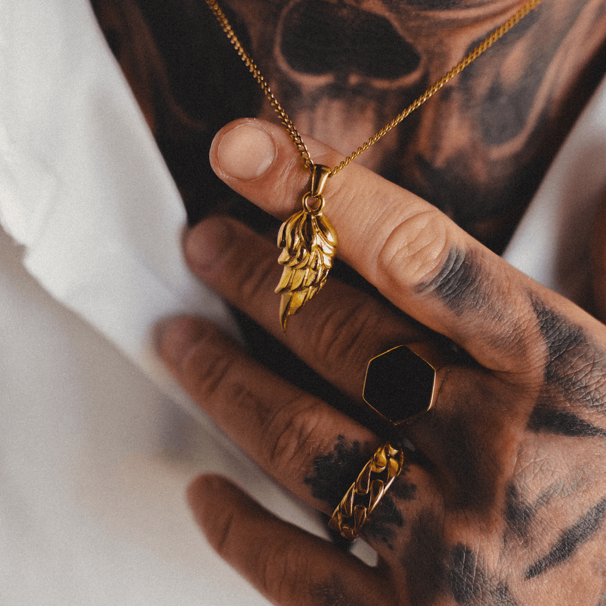 Gold Feather Pendant Necklace