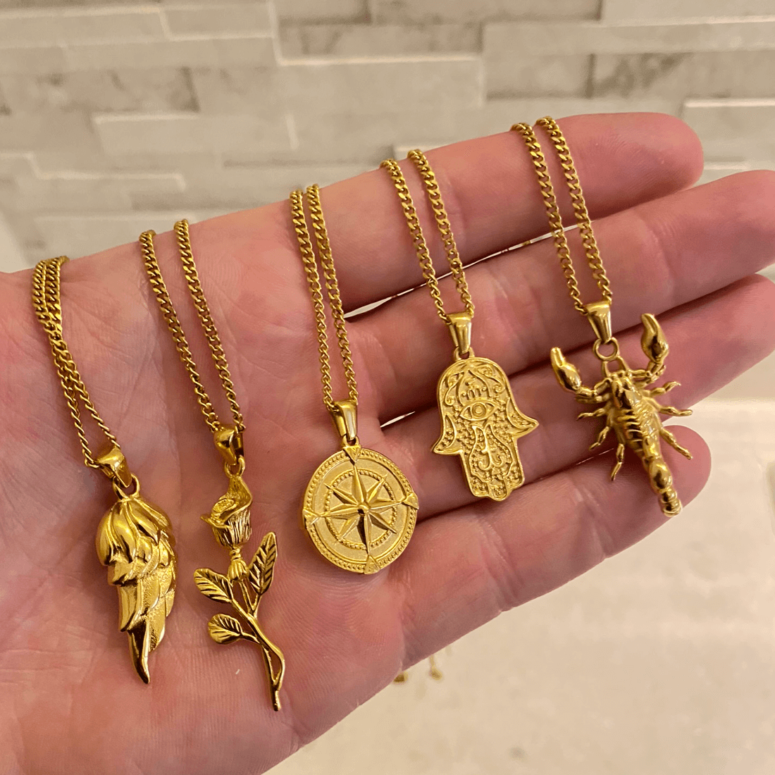 Gold Feather Pendant Necklace